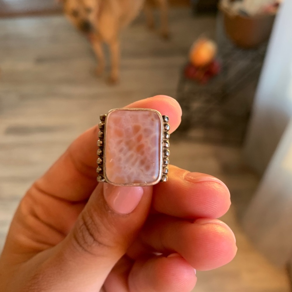 Expandable silver ring.